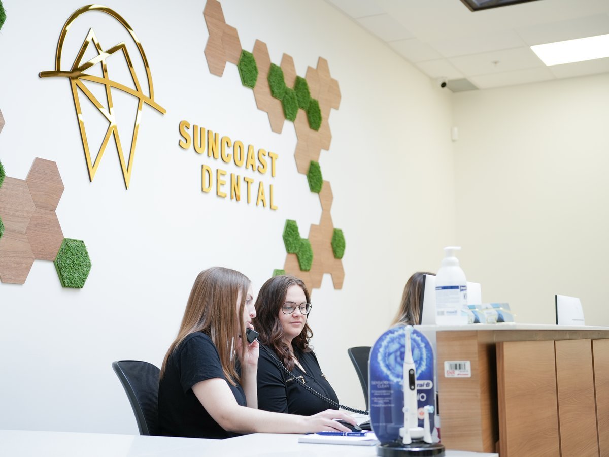 Welcoming dental team at Suncoast Dental ready to care for your smile